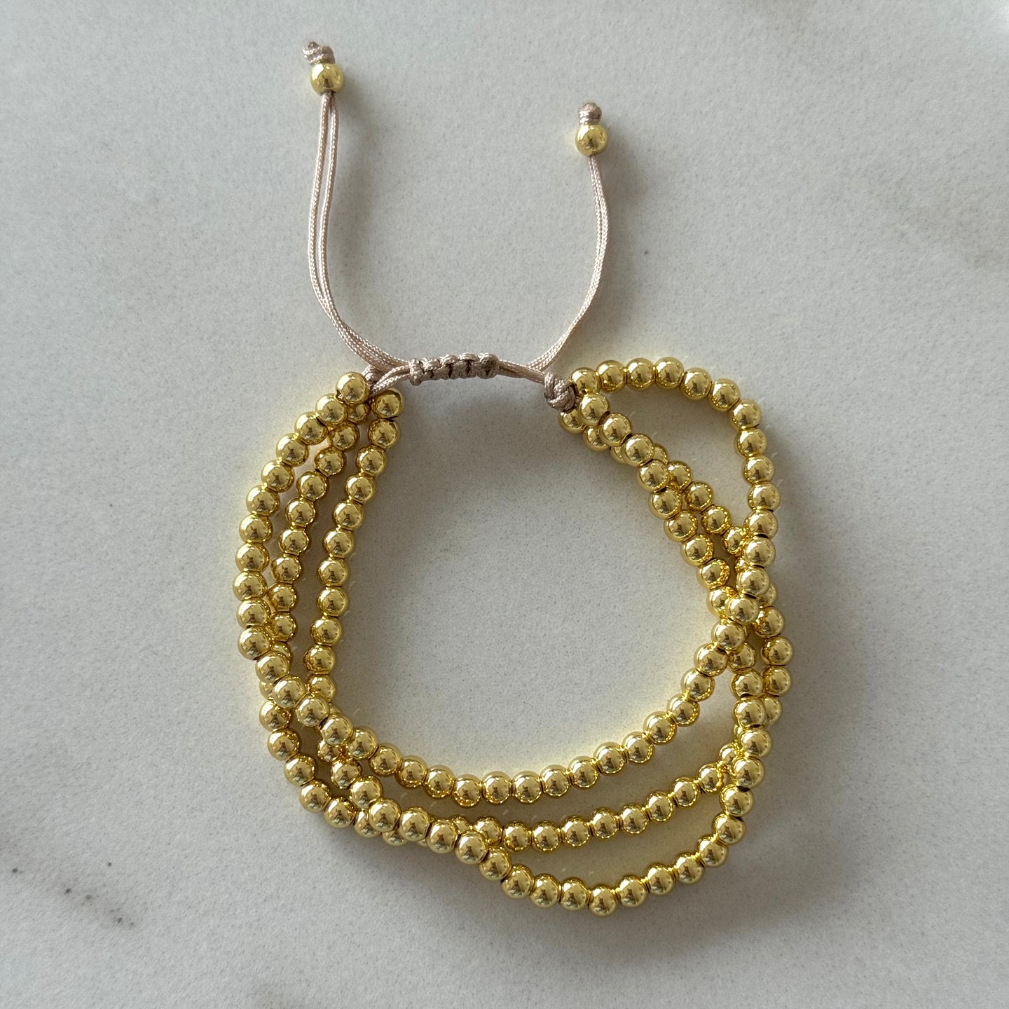 PULSERA TRIPLE BALINES